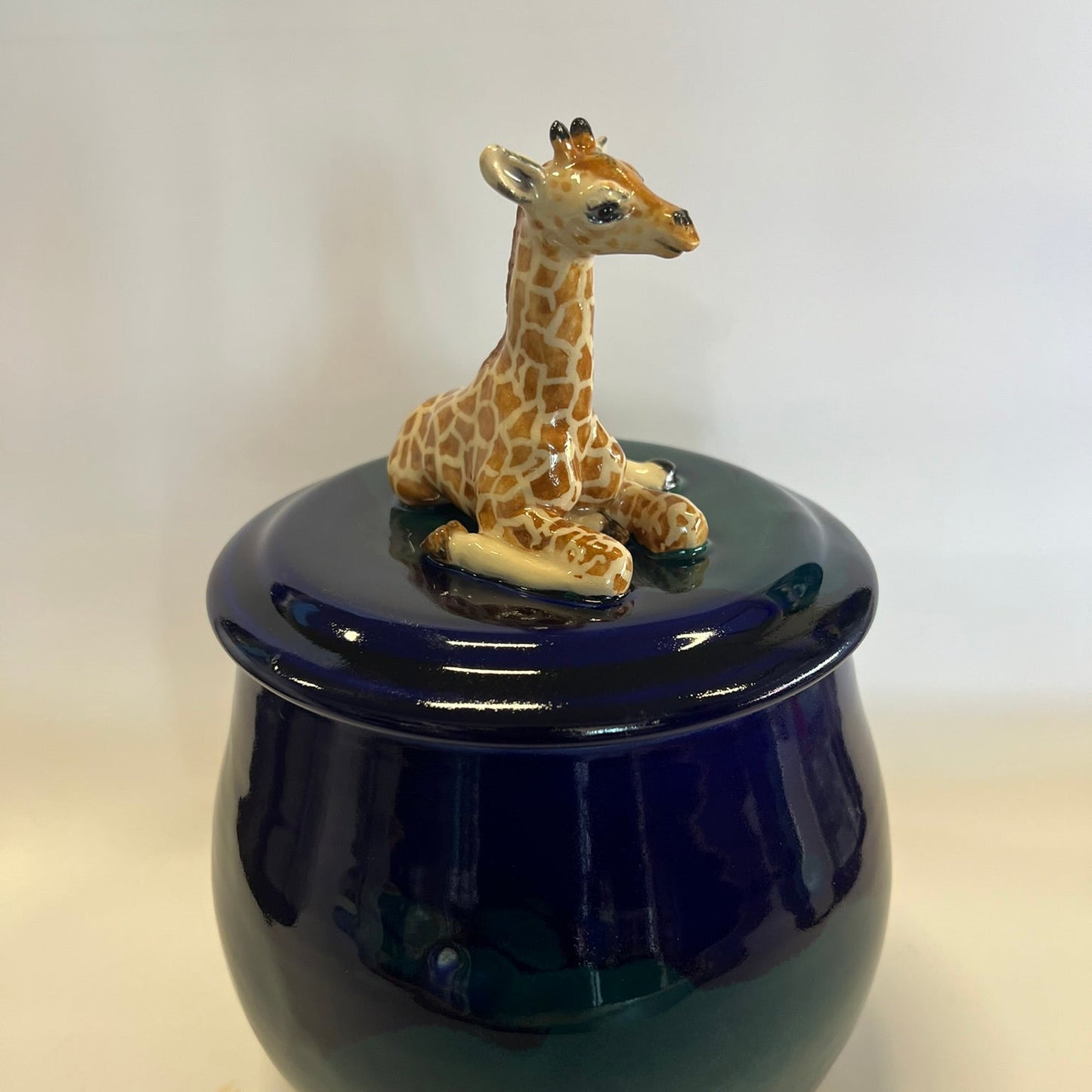 Sold Giraffe on blue