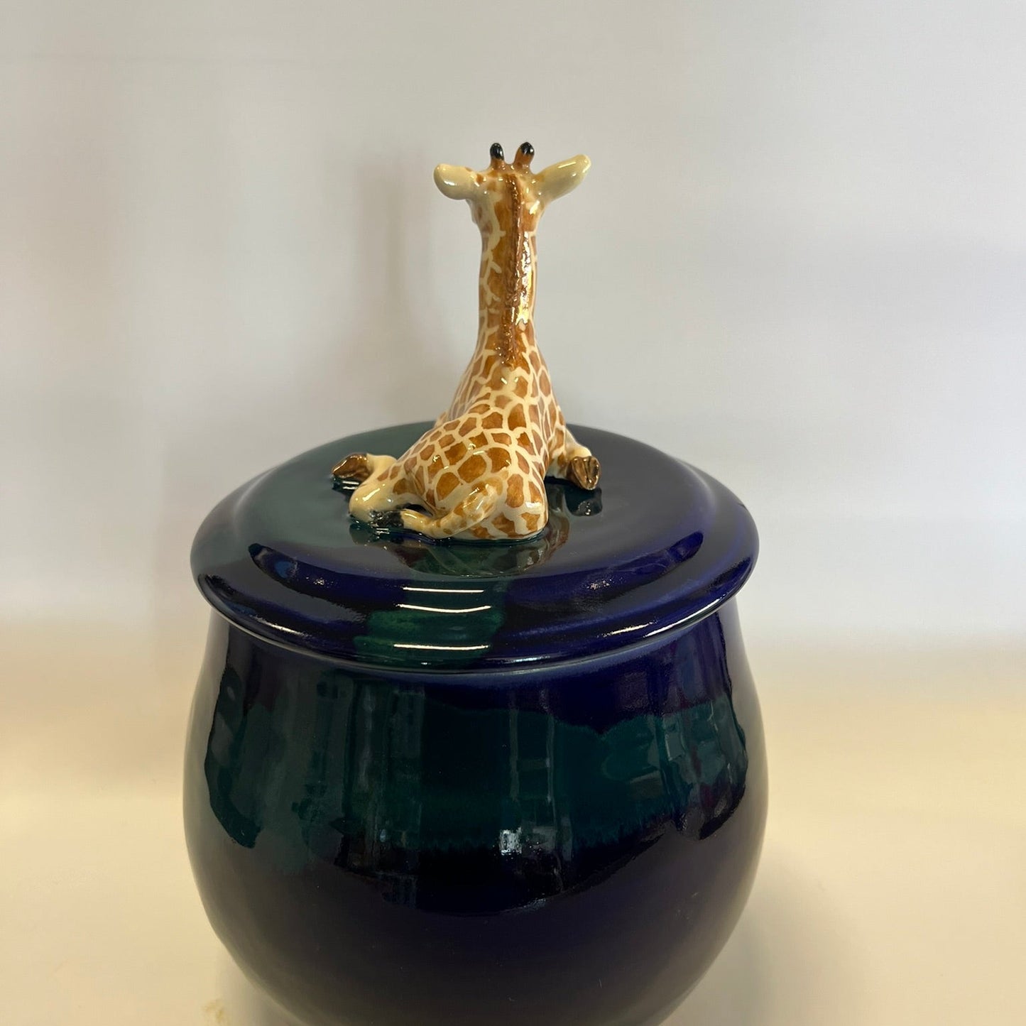 Sold Giraffe on blue