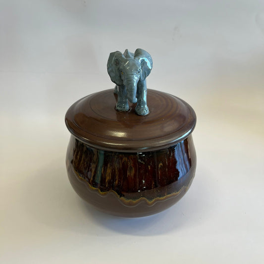Available Elephant on Red Brown