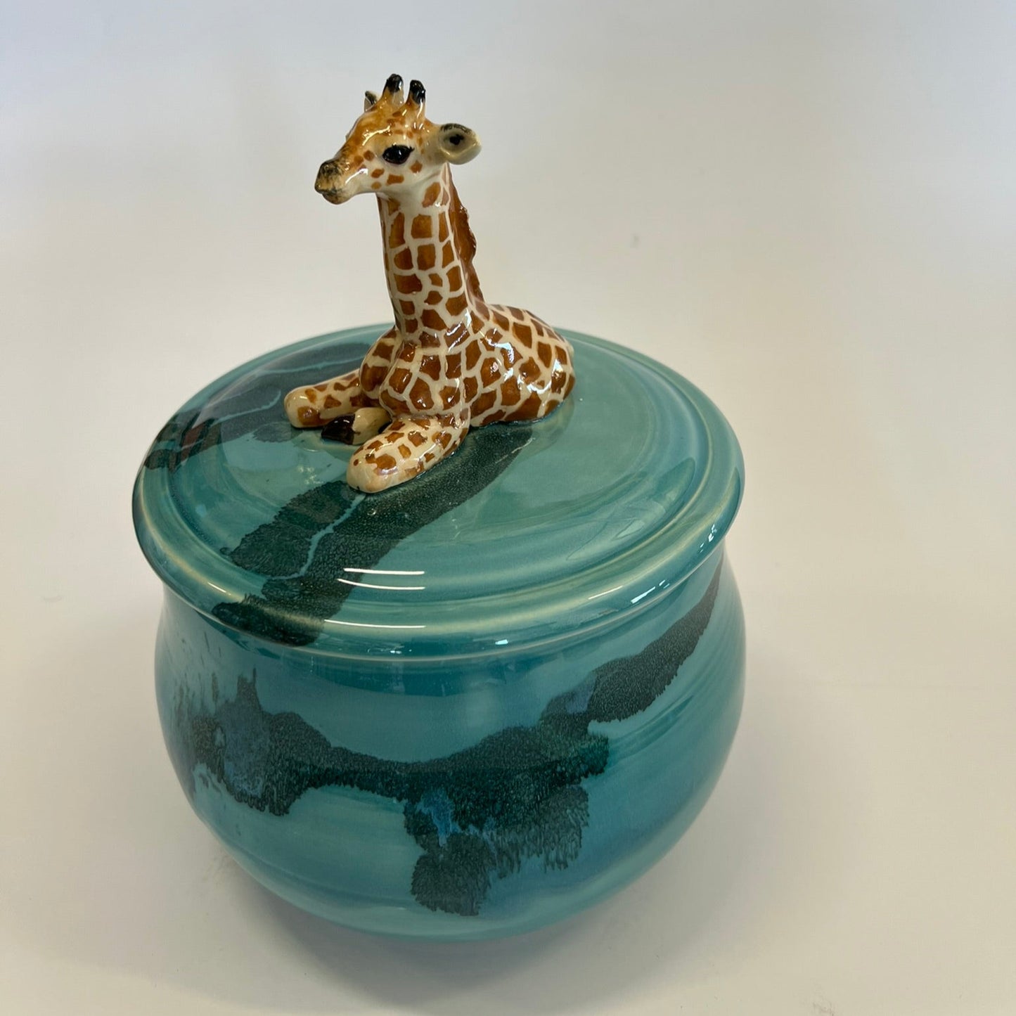 Sold Giraffe on Panama blue