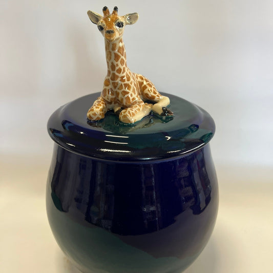 Sold Giraffe on blue